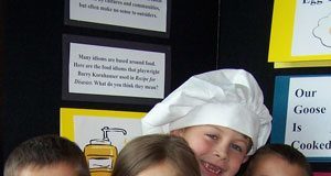 Cousins Will (5), Brayden (7), Lily (6) and Cole (5) of Mesa in front of idiom displayl.Photo: Lynn Trimble