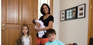 Nadia Day, MD, with her children Ella (5), Jackson (3) and Amelia (1 month).