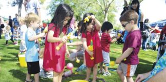 Kids catching fish at the Ultimate Play Date at the Scottsdale Public Library. Photo by Tac Coluccio.