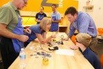 Mayor Stanton and his son Trevor, 8, learning how to solder