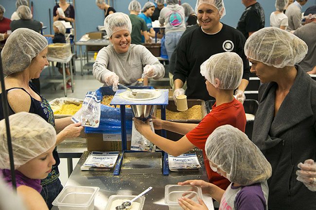 Feed My Starving Children, Mesa, Arizona, family volunteer
