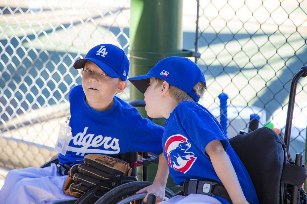 The "Zach Attacks": Zach Zurliene (7) of Gilbert and Zach Bacon (8) of Cave Creek get a chance to catch up between games.