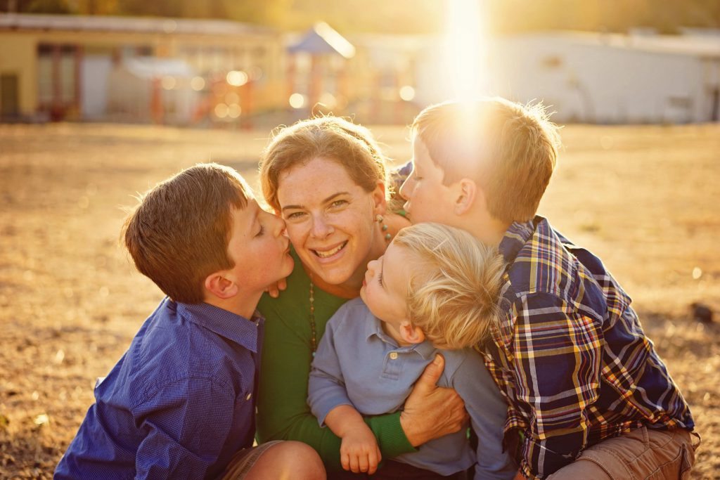 Urbansitter CEO Lynn with her three kids.