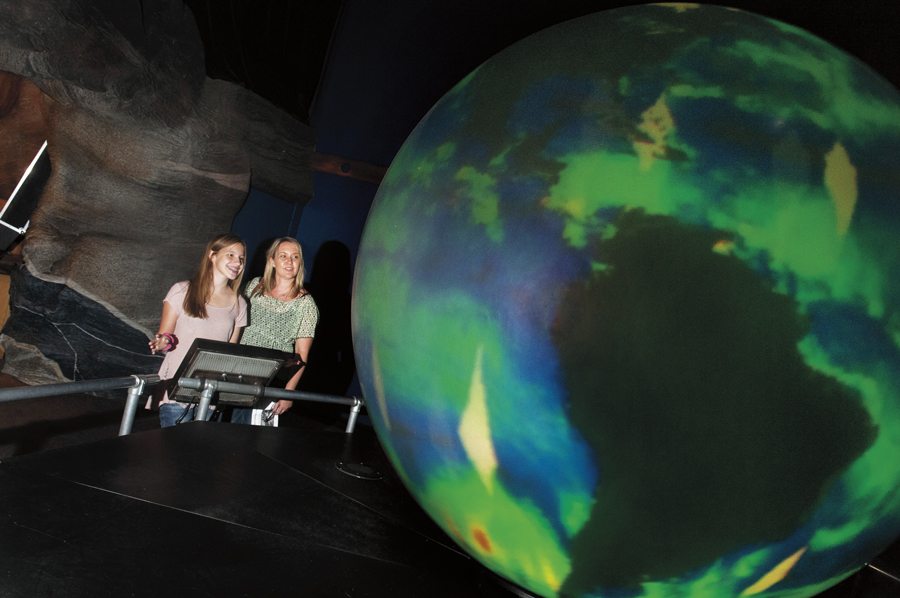 Sheri Smith (right) and her daughter Sarah explore the Arizona Science Center. Photo by Rick D'Elia.