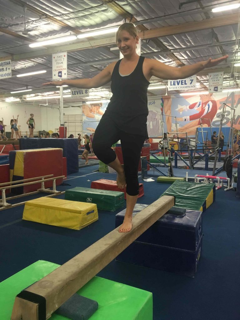 RAK calendar editor Liz Petroff braves the balance beam at Arizona Sunrays Supercamp. Courtesy of Liz Petroff.