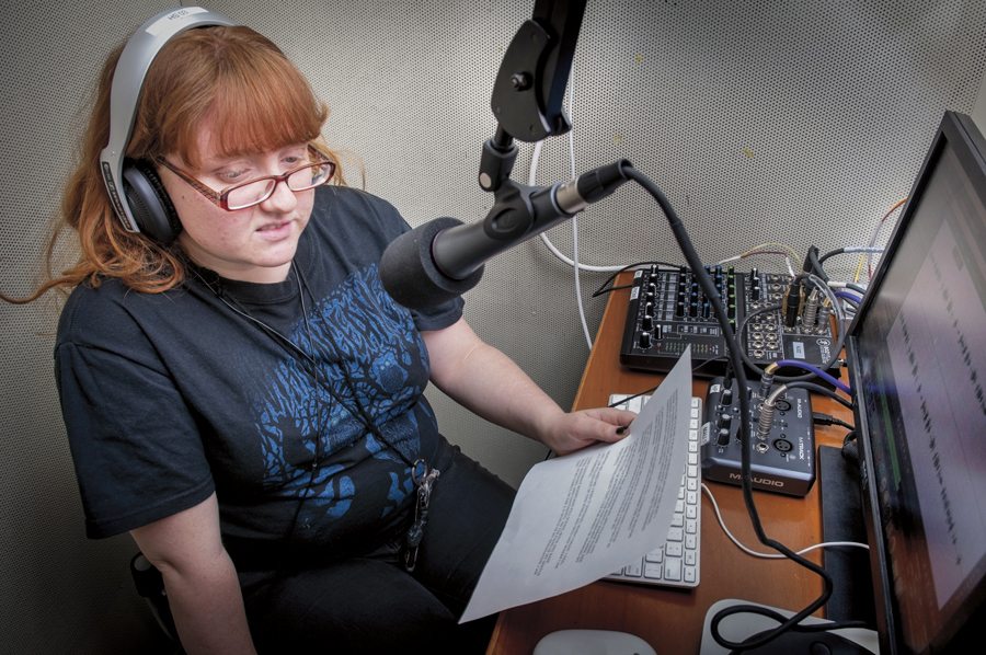 Dianan Heinze (16) works on sound bites for a video piece.