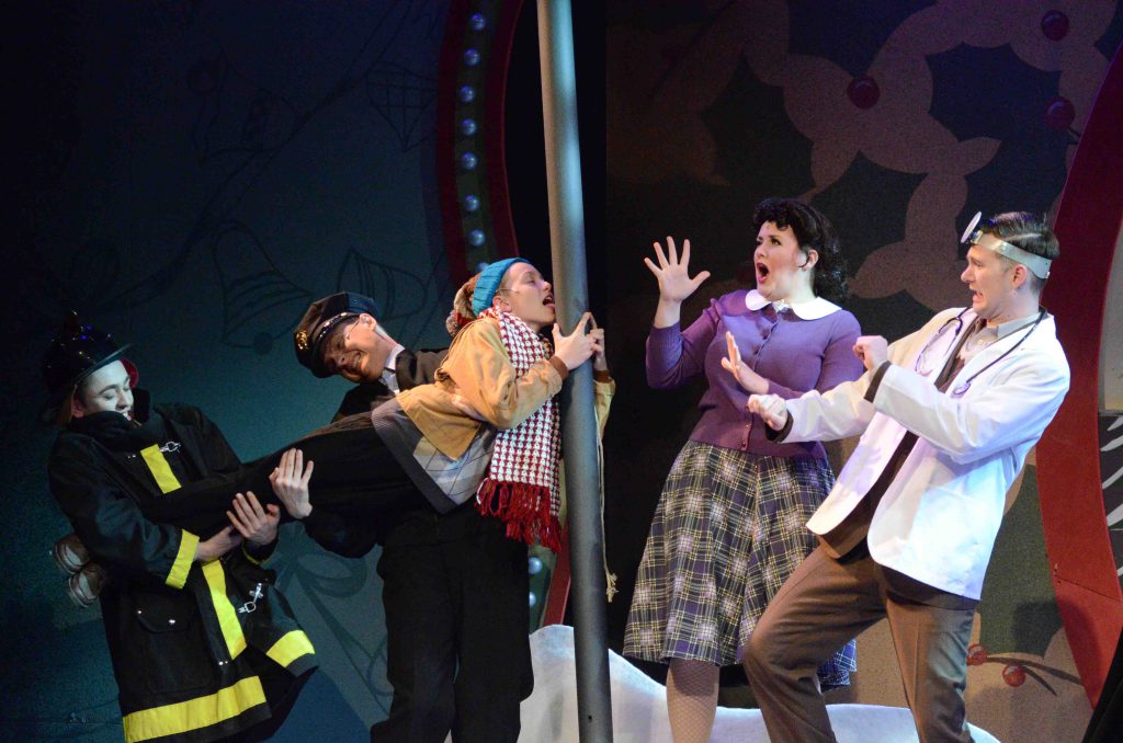 Caelan Koth gets his tongue stuck on the flagpole in "A Christmas Story" at Arizona Broadway Theater.