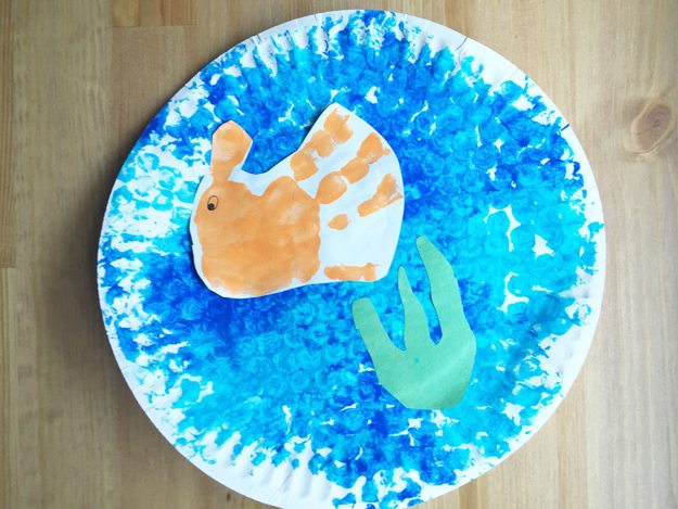 undersea6, orange hand print, green construction paper seaweed, textured plate