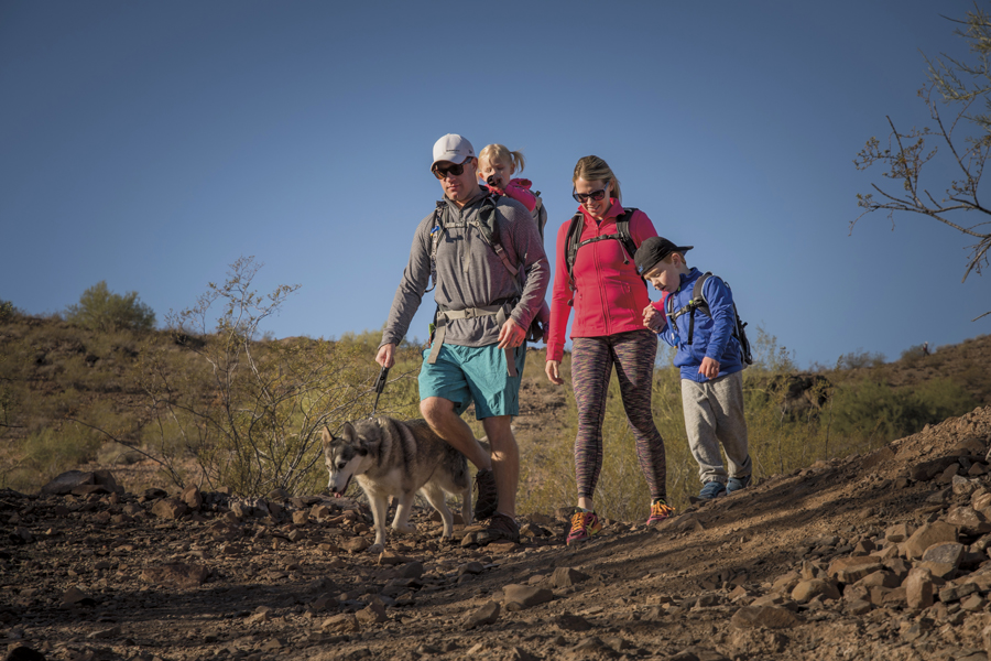 Kurt, Mackenzie (2), Jenny and Carter (4) Donnell and their dog Rio of Phoenix at Lookout Mountain in north Phoenix. Photos by Rick D'Elia.