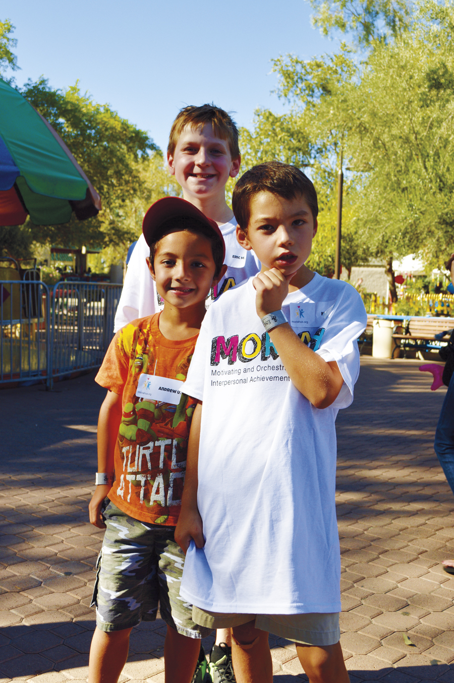 Right: Eric Meyer (background) spent the day with Noah Uhlenhake (right) and his brother Andrew.