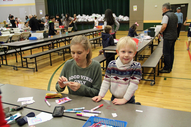 Socks From Santa, Families Giving Back, Central Arizona Shelter Services, Raising Arizona Kids, family volunteering, Phoenix, Arizona